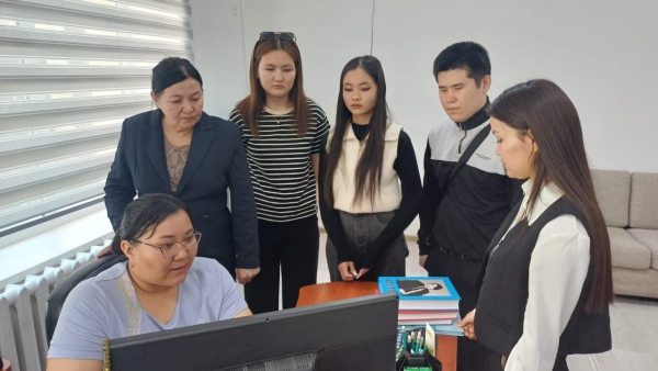 BD-24-1 academic group under the &quot;Library Science&quot; educational program and their advisor G.K. Esmagambetova